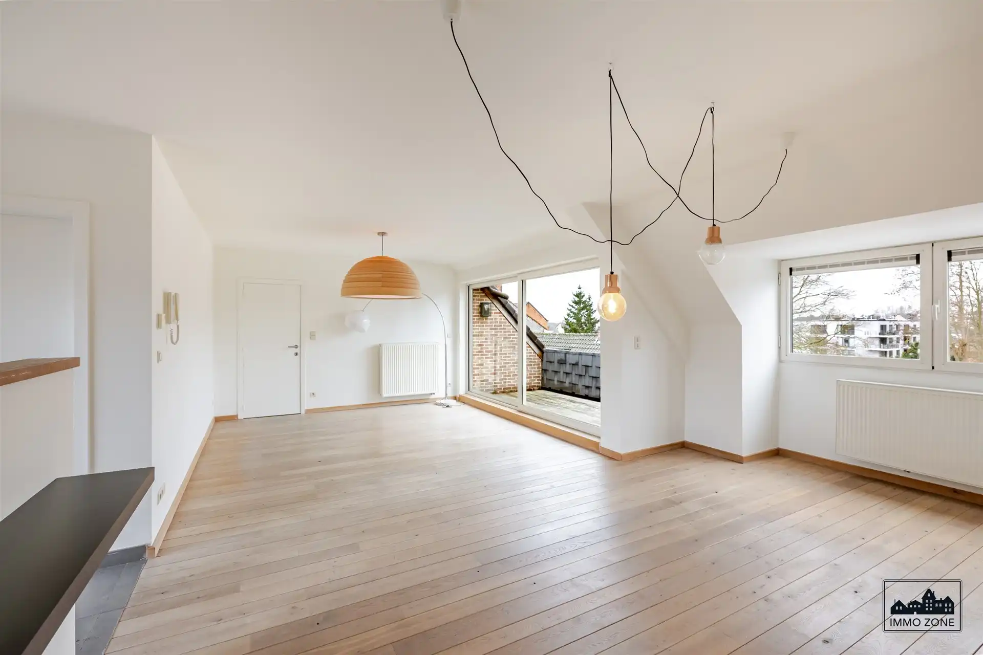 Ruim dakappartement (156 m²) met terras & garage foto {{pictureIndex}}