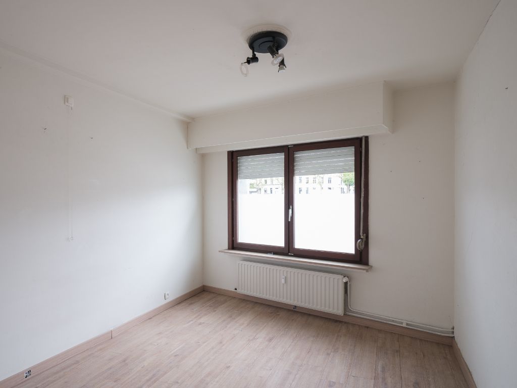 Op te frissen appartement met buitenruimte en uitzonderlijk potentieel foto 12