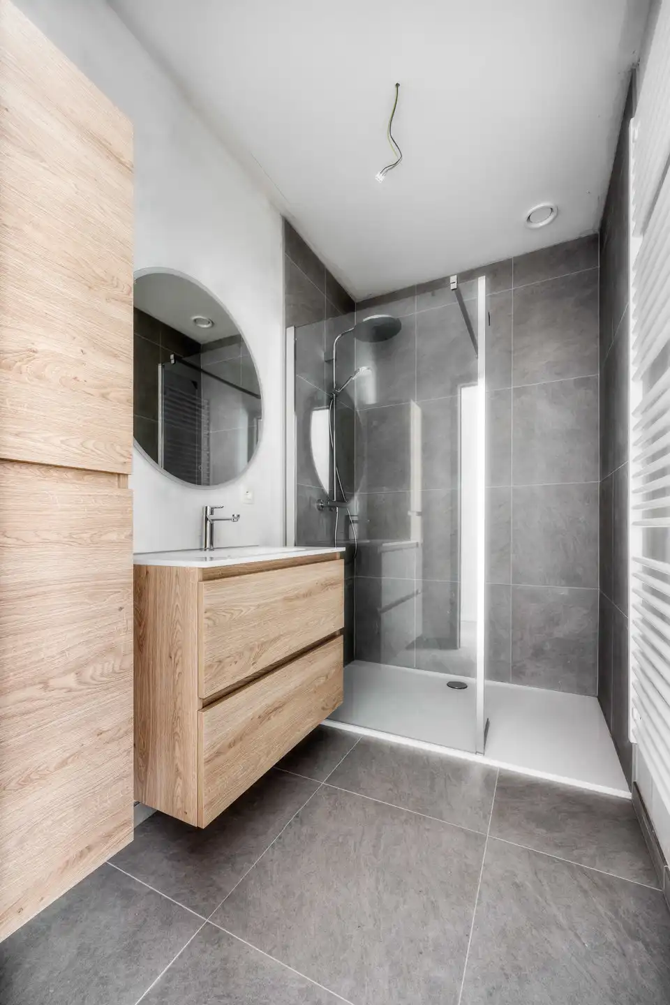 Stijlvol gelijkvloers appartement met tuin foto 12