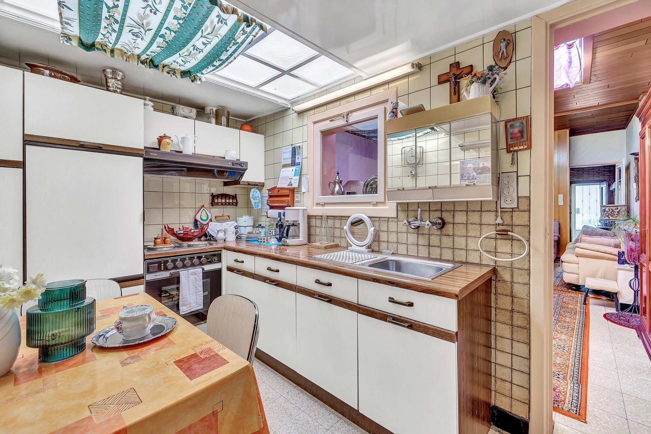 Te renoveren woning met tuin en perceel met garage foto 9