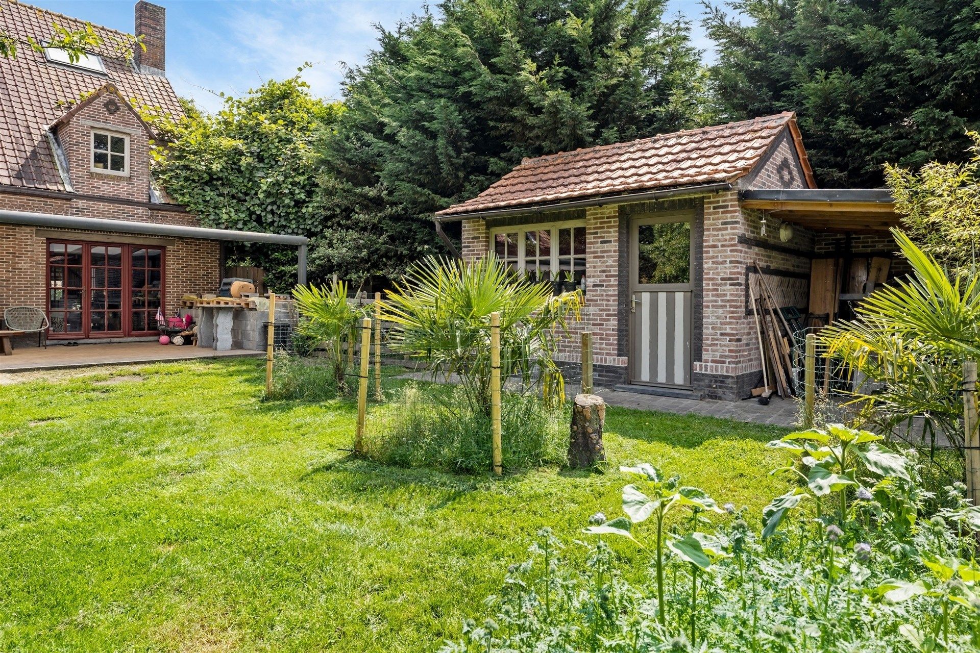 Ruim opgezette, landelijke woning met aangename tuin, 6 slaapkamers en een ingerichte woonstudio op de 2e verdieping foto 31