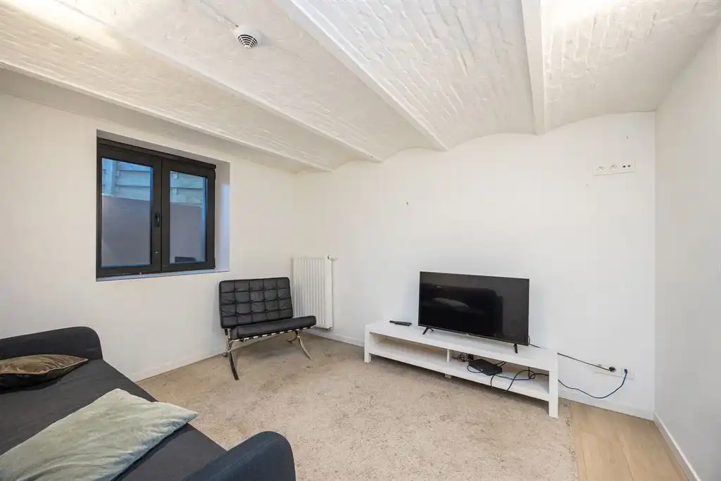 Opbrengsteigendom met 5 gerenoveerde studentenkamers foto 11