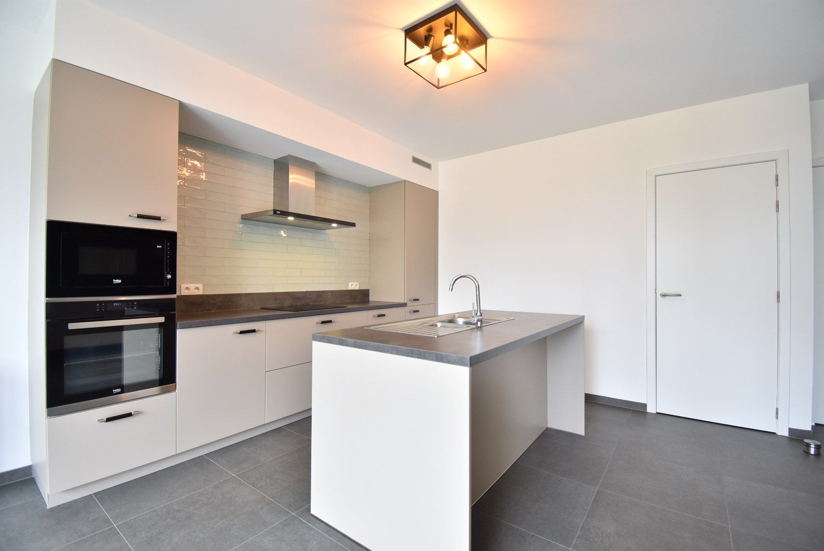 Aantrekkelijk recent gelijkvloers appartement, met 1 slaapkamer, ruim terras, privétuin en standplaats in centrum van Beverst.  foto 14