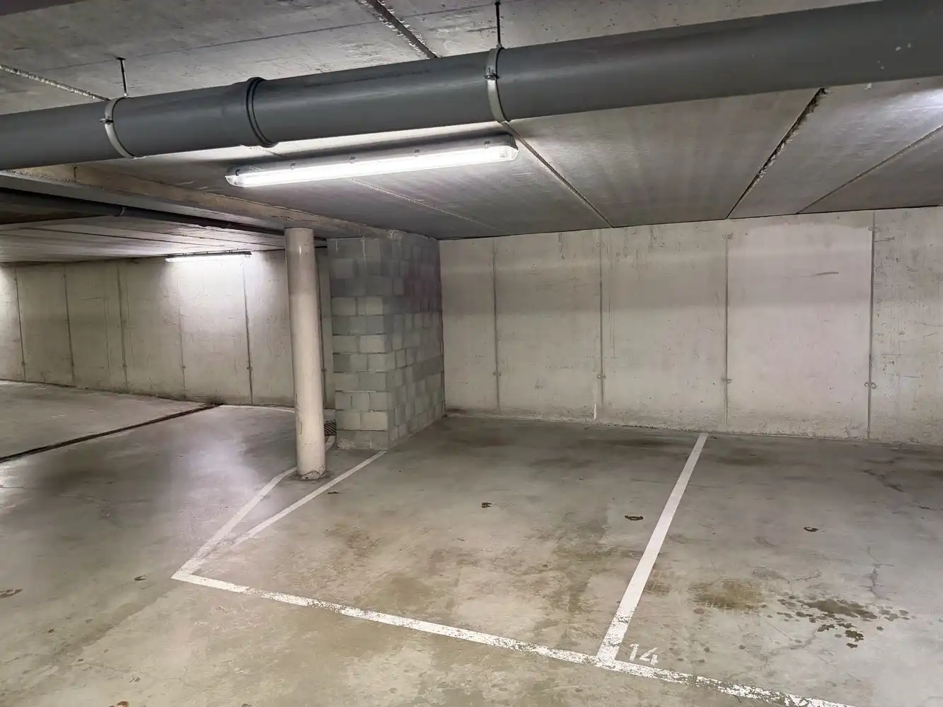 Autostaanplaats te koop op goed bereikbare locatie nabij station & centrum Lier foto {{pictureIndex}}