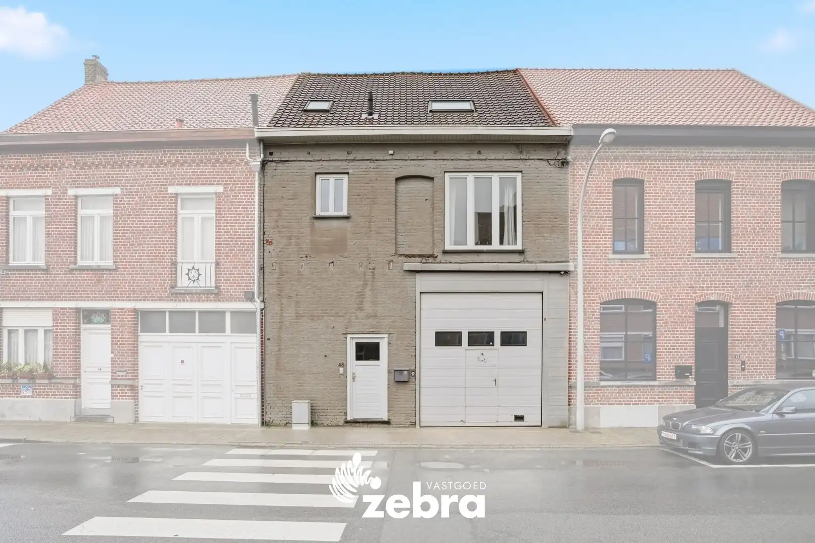 Woning met magazijn te Heule! foto {{pictureIndex}}