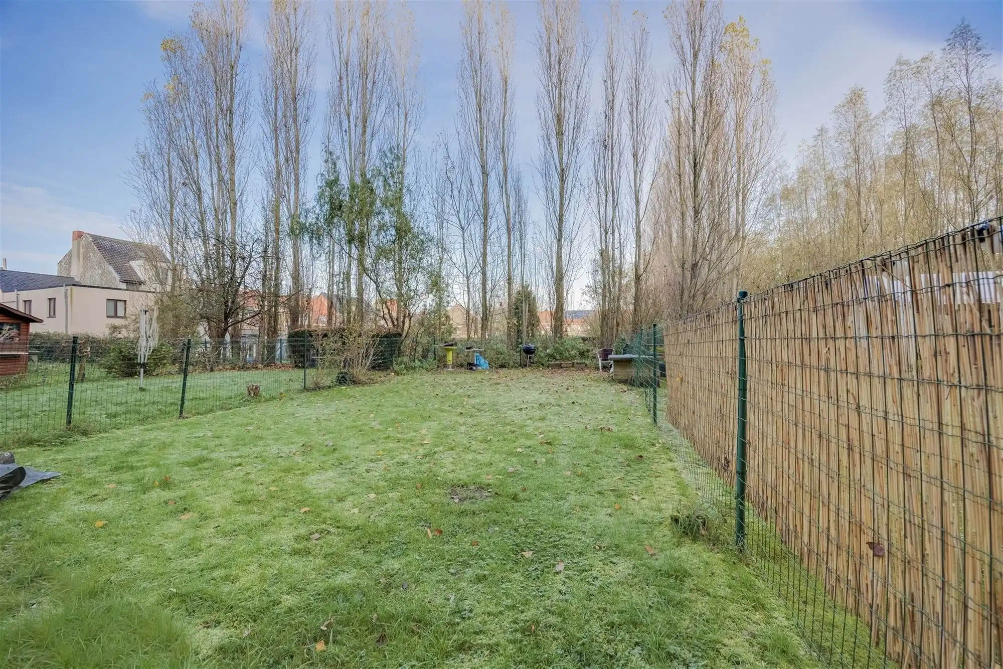 Instapklaar 2 slaapkamer appartement met gezellige tuin foto 16