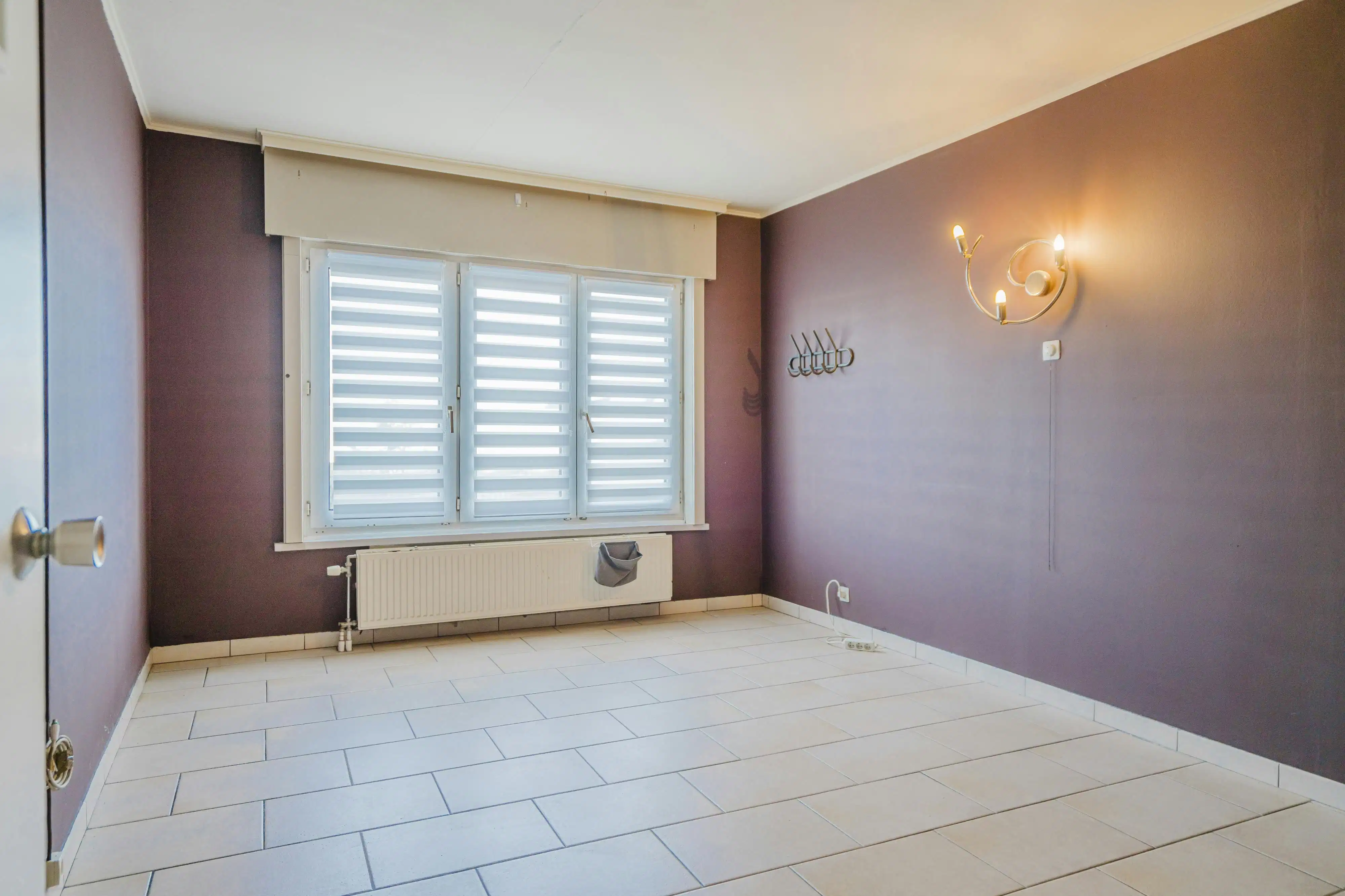 Opbrengsteigendom bestaande uit 12 garages, huis en appartement foto 9