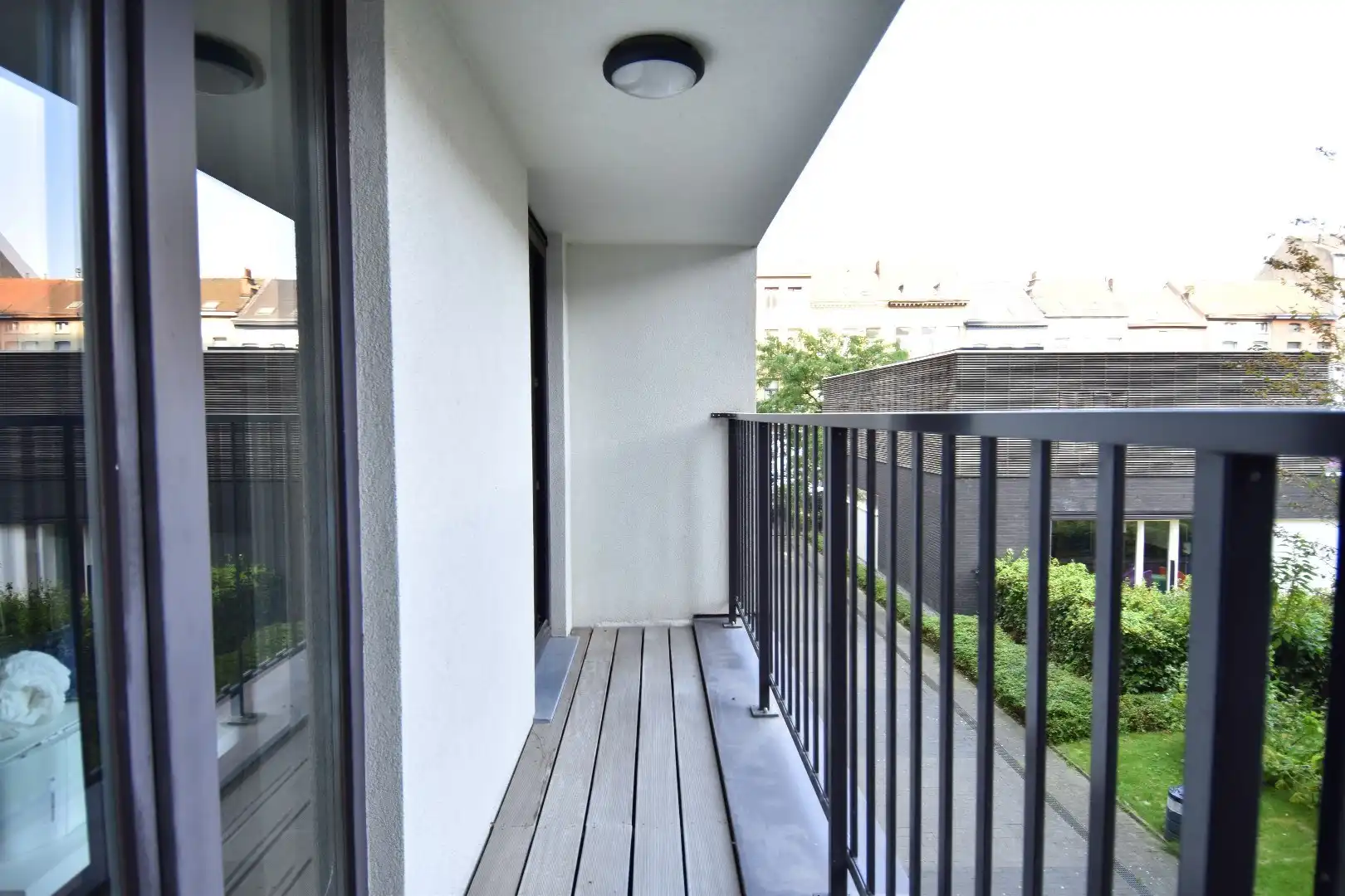 Duplexappartement met 3 slaapkamers, 3 terrassen, ruime autostaanplaats én privatieve berging te Schaarbeek foto 12