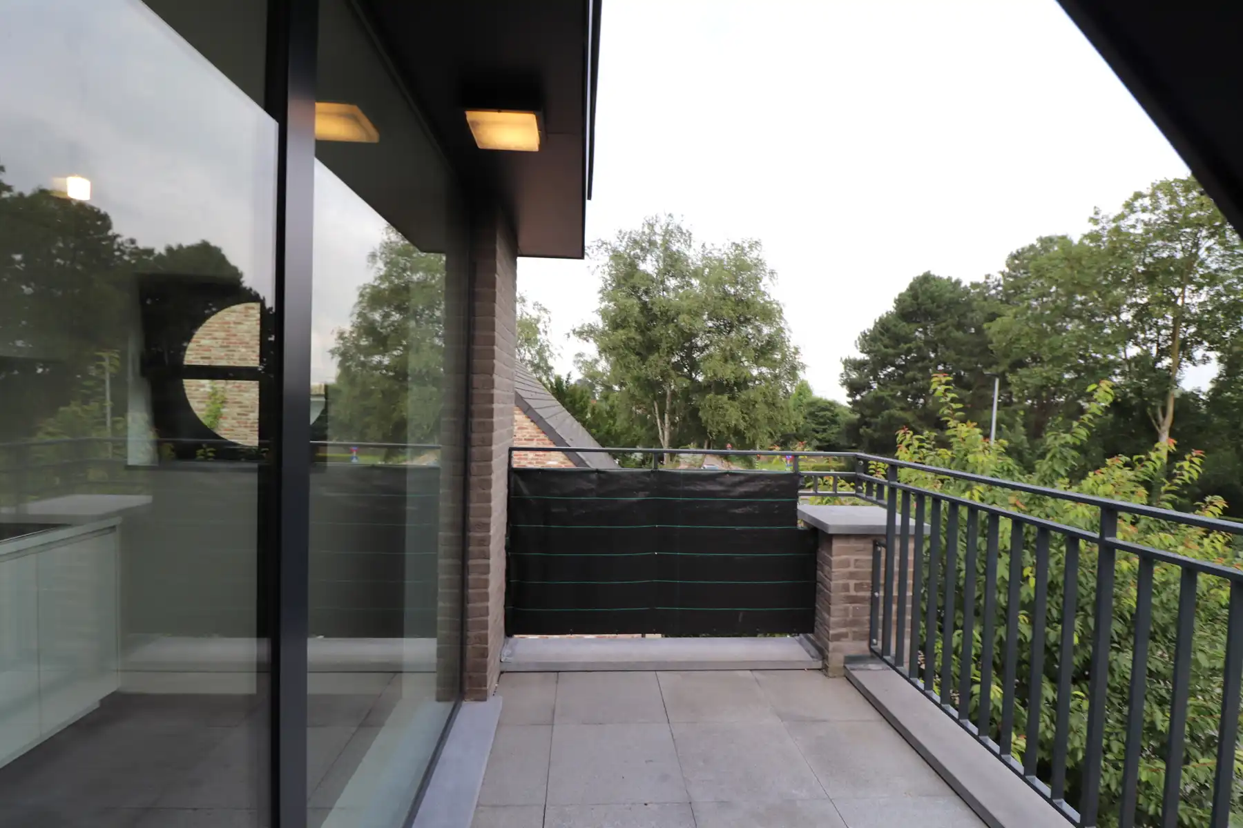 Een recent duplexappartement op de tweede en op de dakverdieping - met terras en garage. foto 12