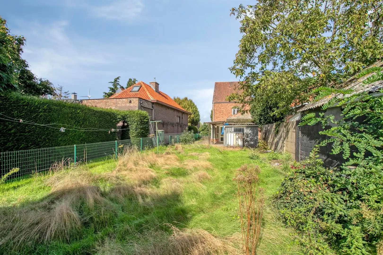 Rustig gelegen, te renoveren open bebouwing met grote zonnige tuin. foto 20
