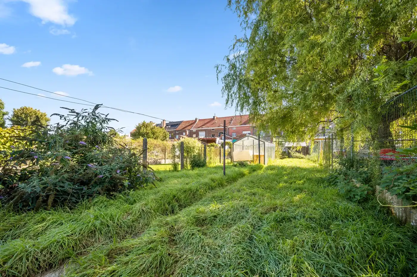 Charmante rijwoning met 2 slpk, tuin en parking foto 25