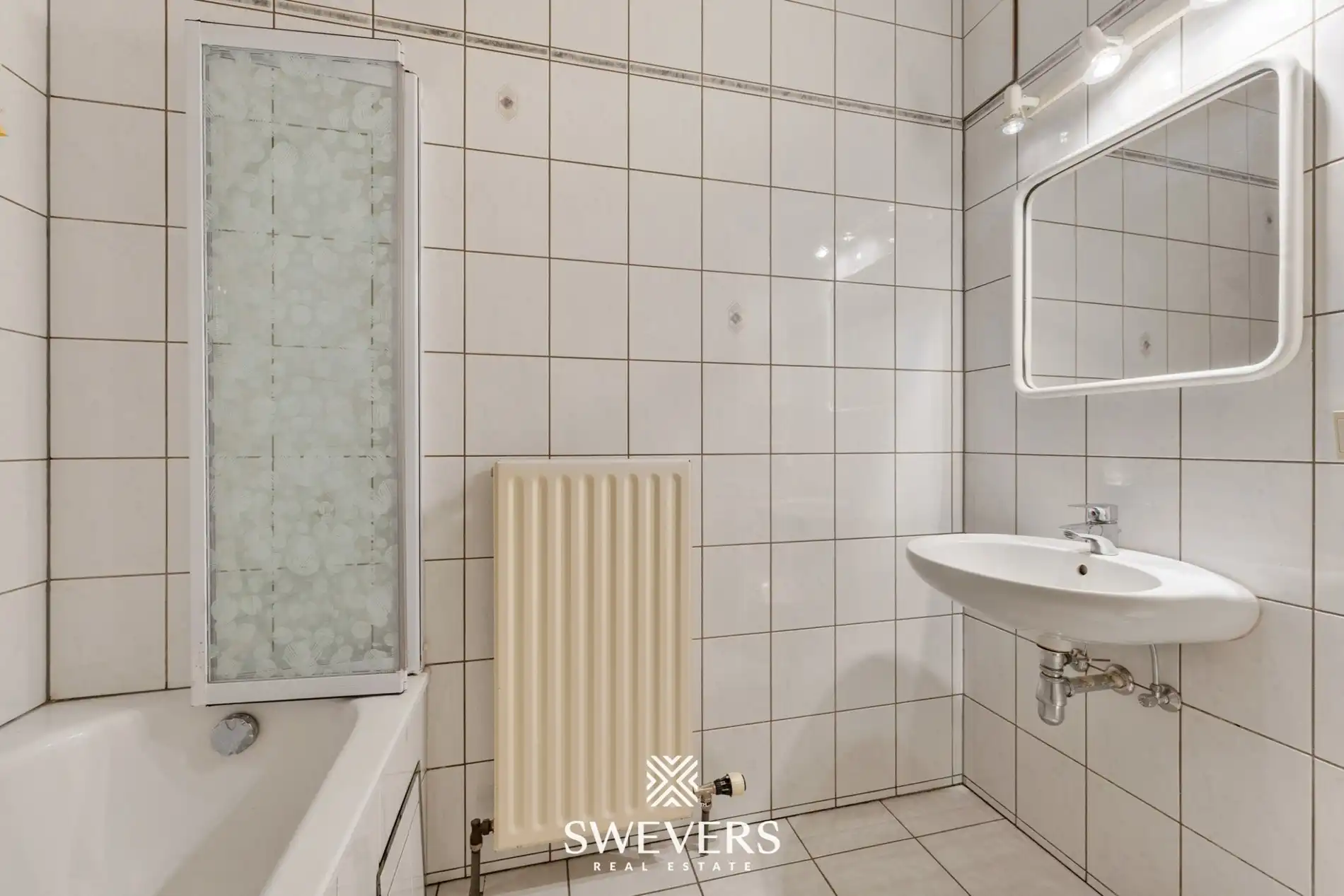 Ruim appartement met 3 slpk en veel lichtinval in Borgloon foto 11