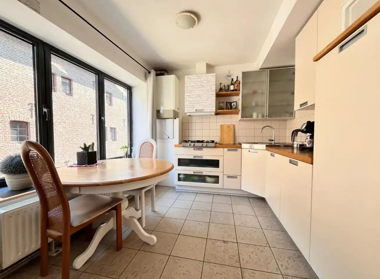 Unieke investeringsopportuniteit in het hart van Maaseik Handelspand + 2 verhuurde appartementen | Centrale ligging | Interessant verhuurpotentieel foto 10