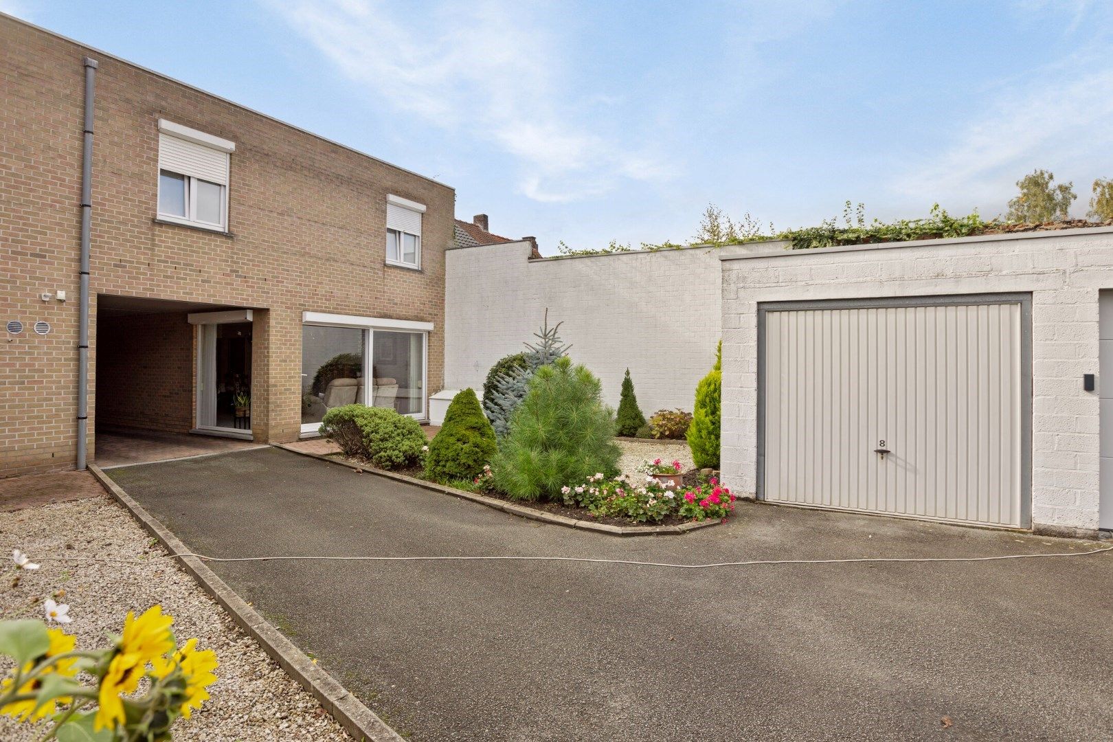 Gelijkvloers appartement met 1 slaapkamer, tuin en garage! foto 2