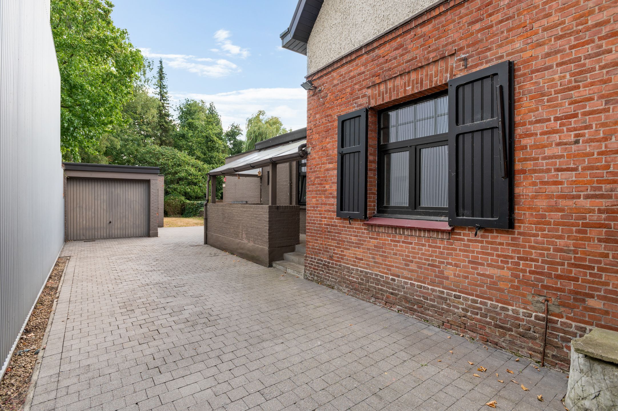 Halfopen woning met 2 slaapkamers en een grote tuin in Brasschaat te huur! foto 20