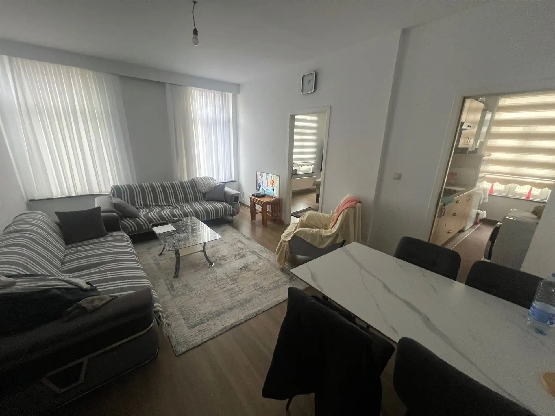 Opbrengsteigendom met commerciële gelijkvloers en 6 appartementen foto 9