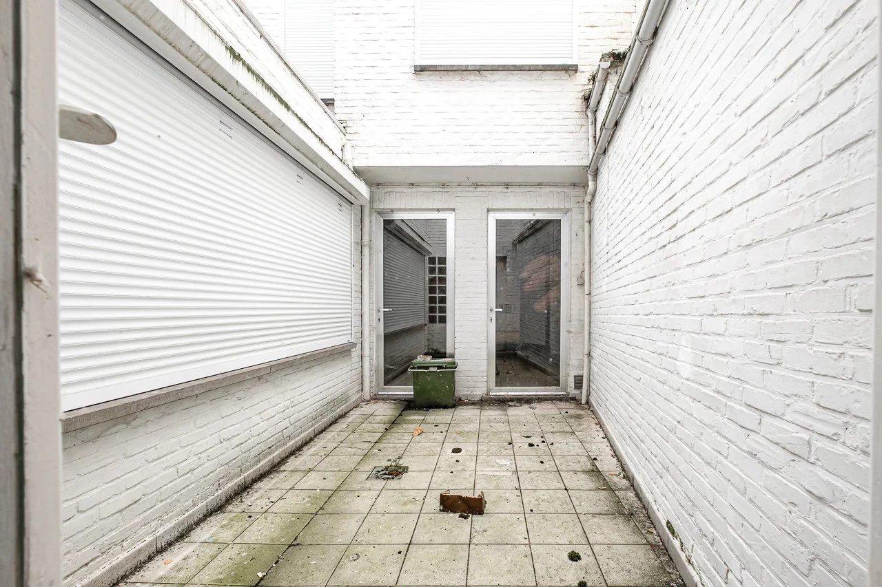 Te renoveren handelsruimte met woonst op toplocatie foto 8