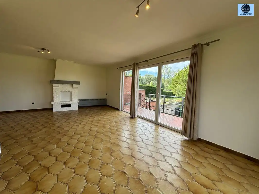 HALFOPENBEBOUWING MET 3 SLAAPKAMERS, TUIN EN GARAGE foto 8