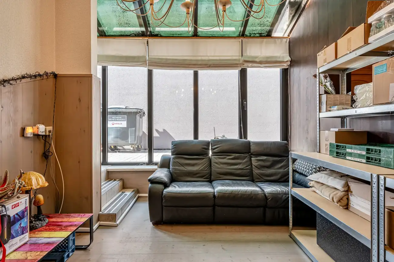 Te renoveren halfopen woning met inpandige garage, grote werkruimte (ca. 145m²) en aangename tuin met open zicht in Ertvelde! foto 5