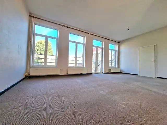 Ruim duplex appartement met tuintje foto 4