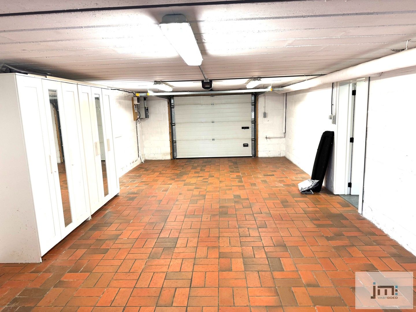Ruime open bebouwing met tuin en garage foto 13