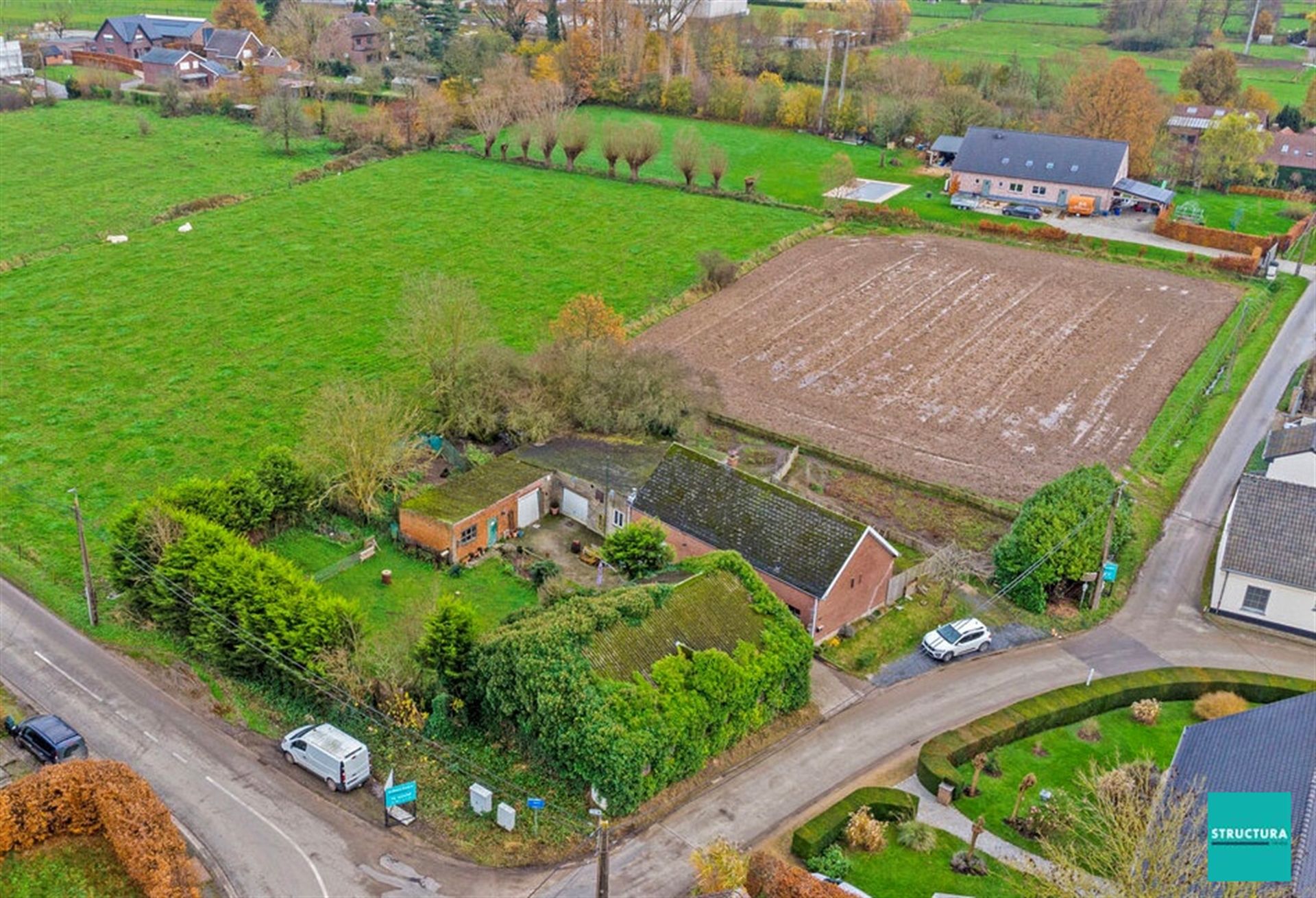 Hoofdfoto van de publicatie: Hoeve met landbouwgrond in het groene Merchtem

.