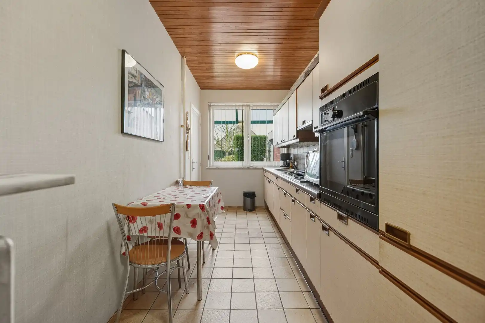 Op te frissen halfopen bebouwing op de Tiense stadsrand foto 12