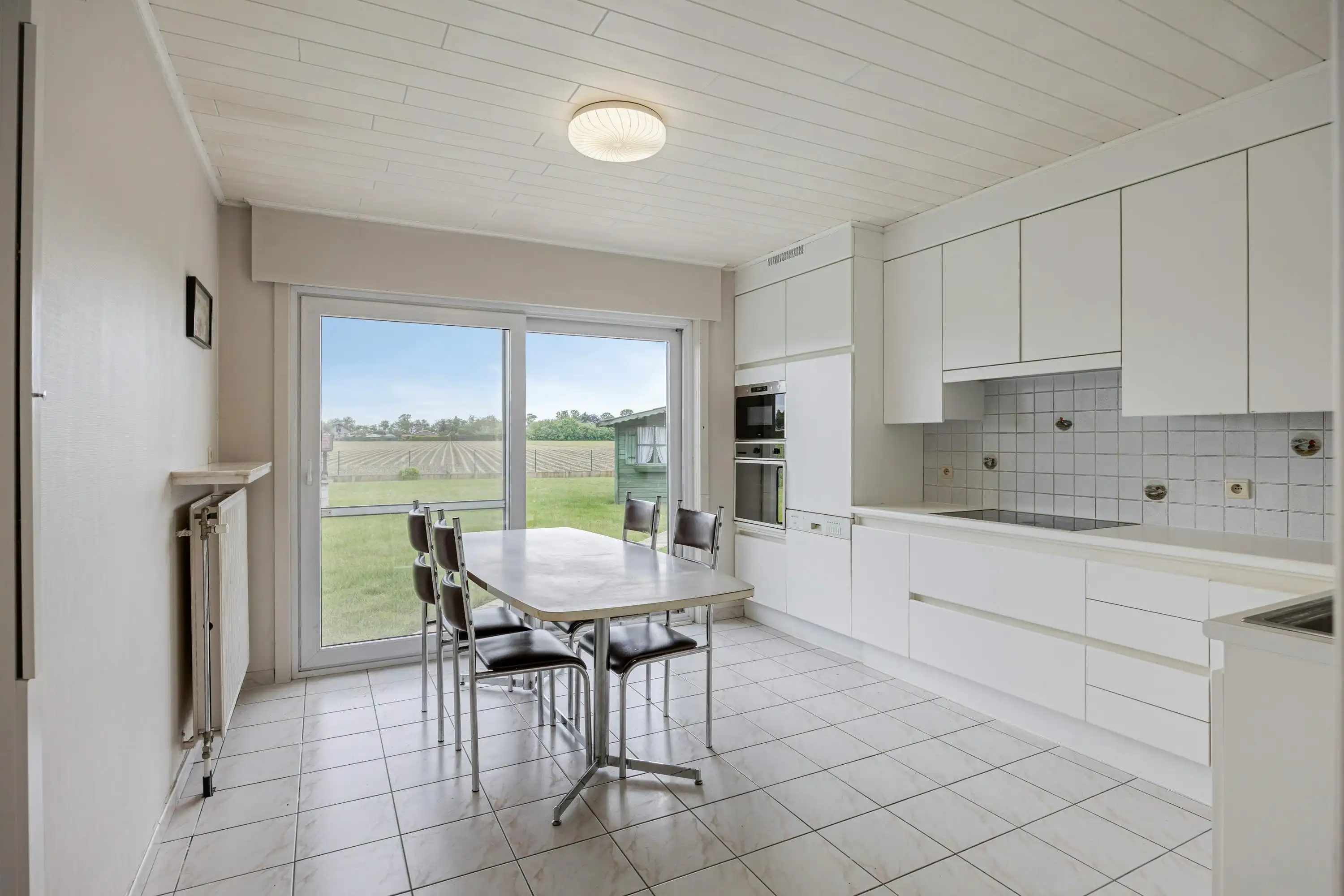 Charmante, op te frissen woning op een toplocatie in Aalter foto 5