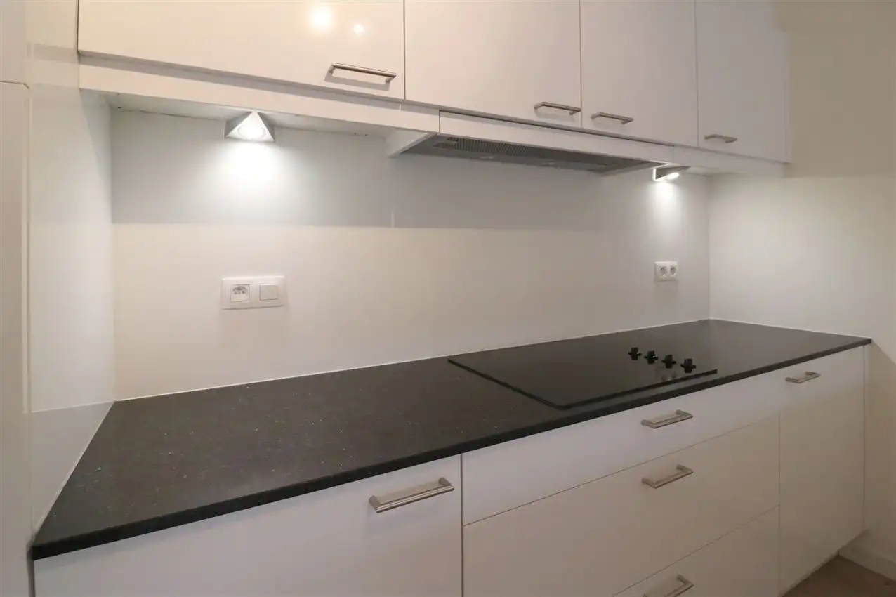 Gelijkvloers appartement met 2 slpk., terras en autostaanplaats foto 23
