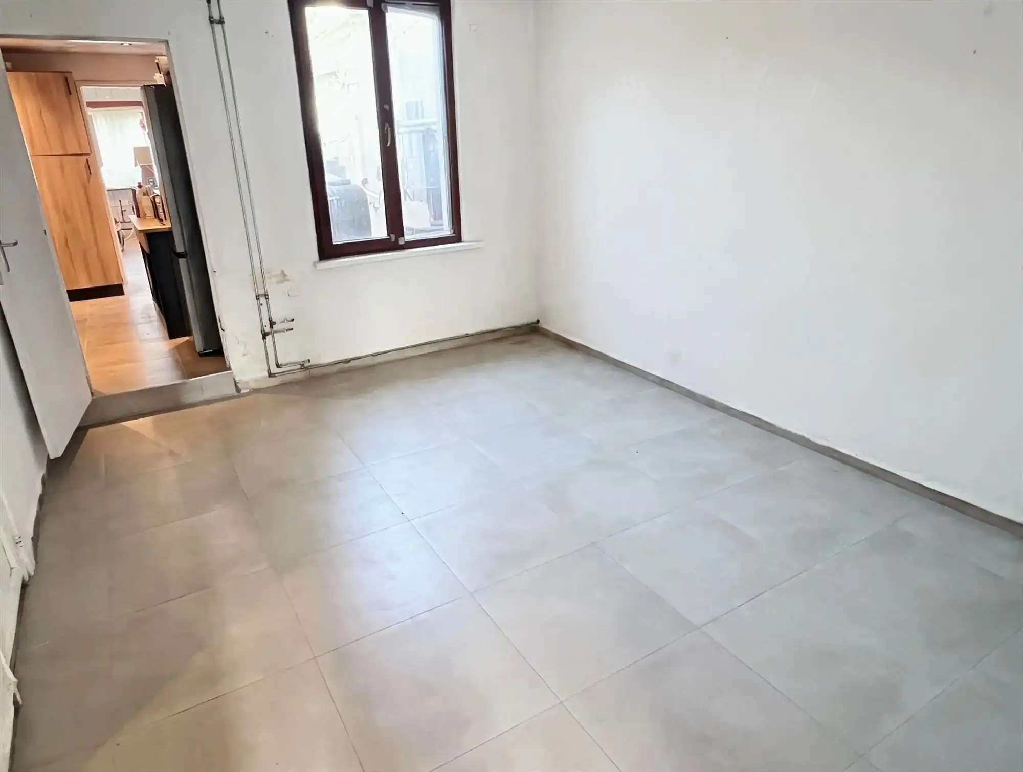 ruime woning met 4 slaapkamers, tuin en achteringang. foto 7