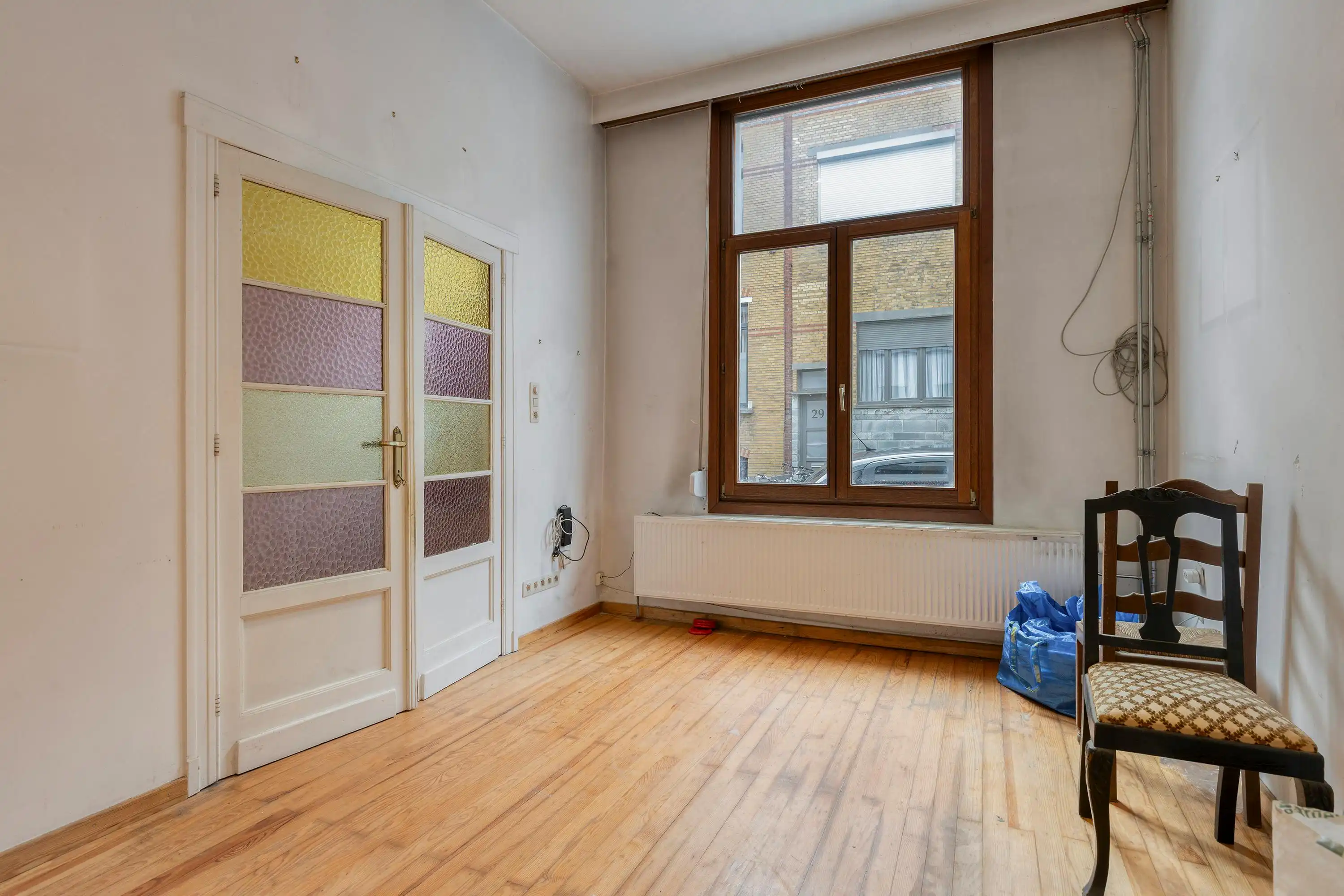 Op te frissen huis met 4 slaapkamers te koop in Borgerhout! foto 6