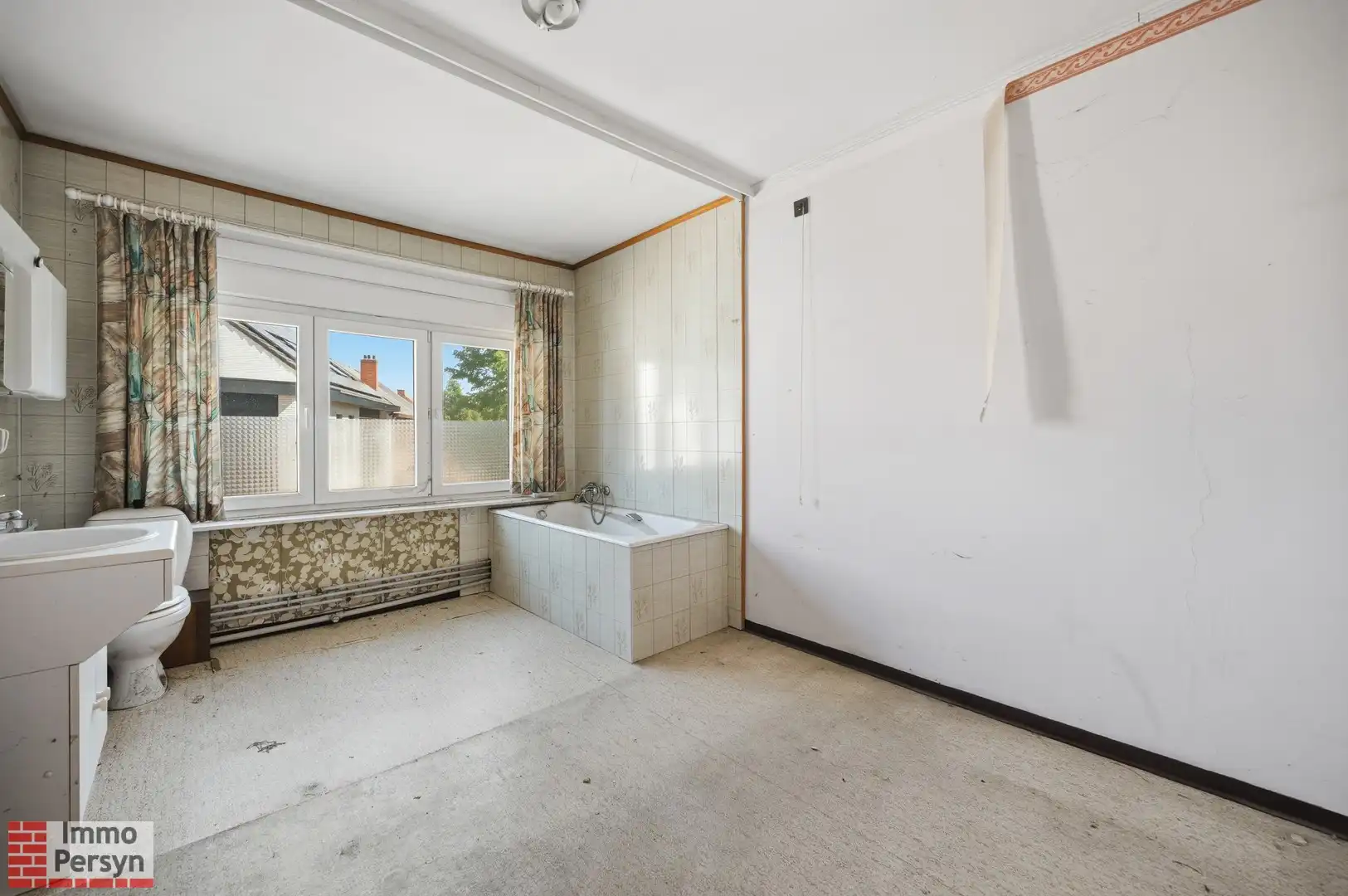 Te renoveren rijwoning met tuin in hartje Zichem foto 10