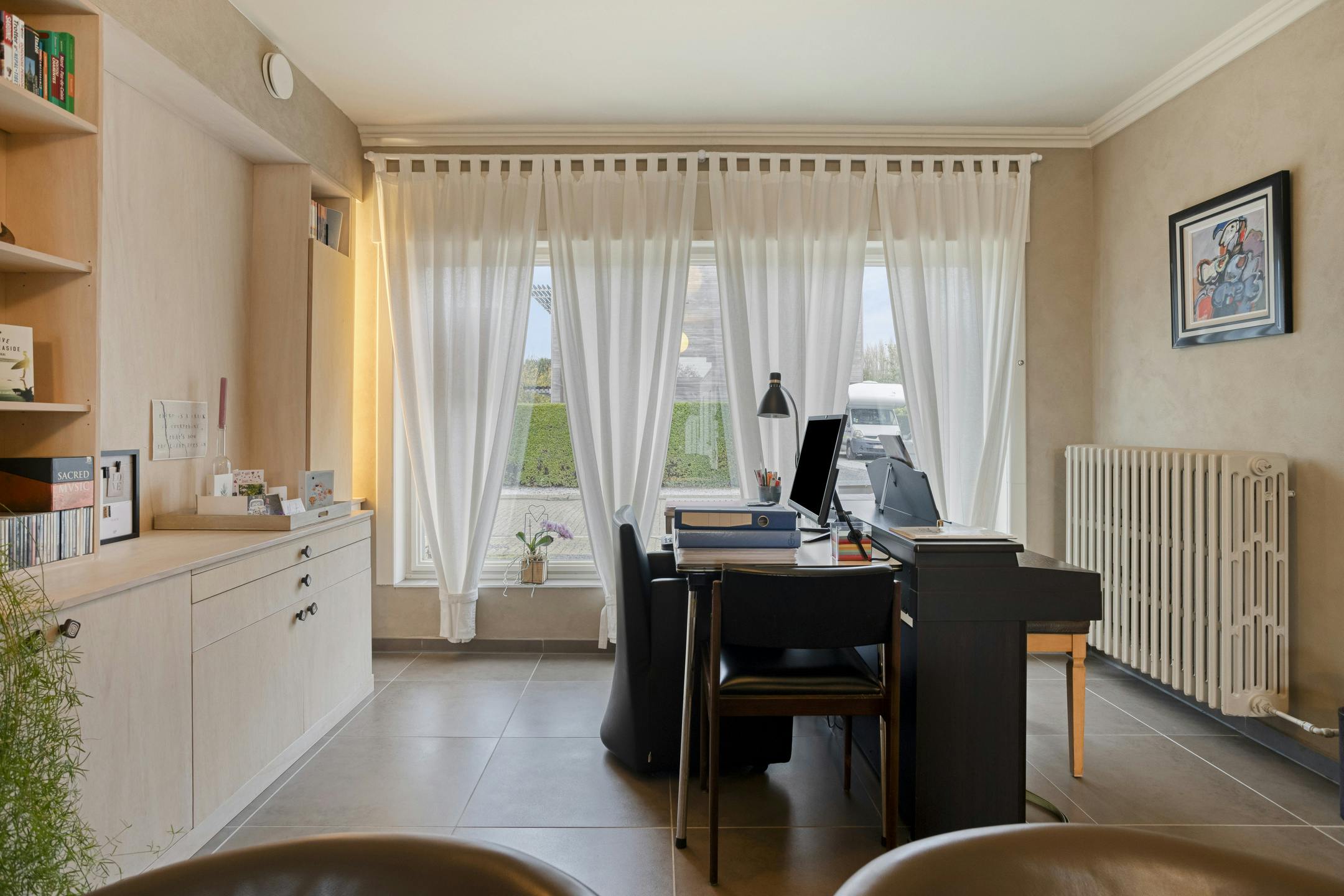 Instapklare woning met 3 slaapkamers, 2 badkamers, zuidgerichte tuin en garage. foto 14