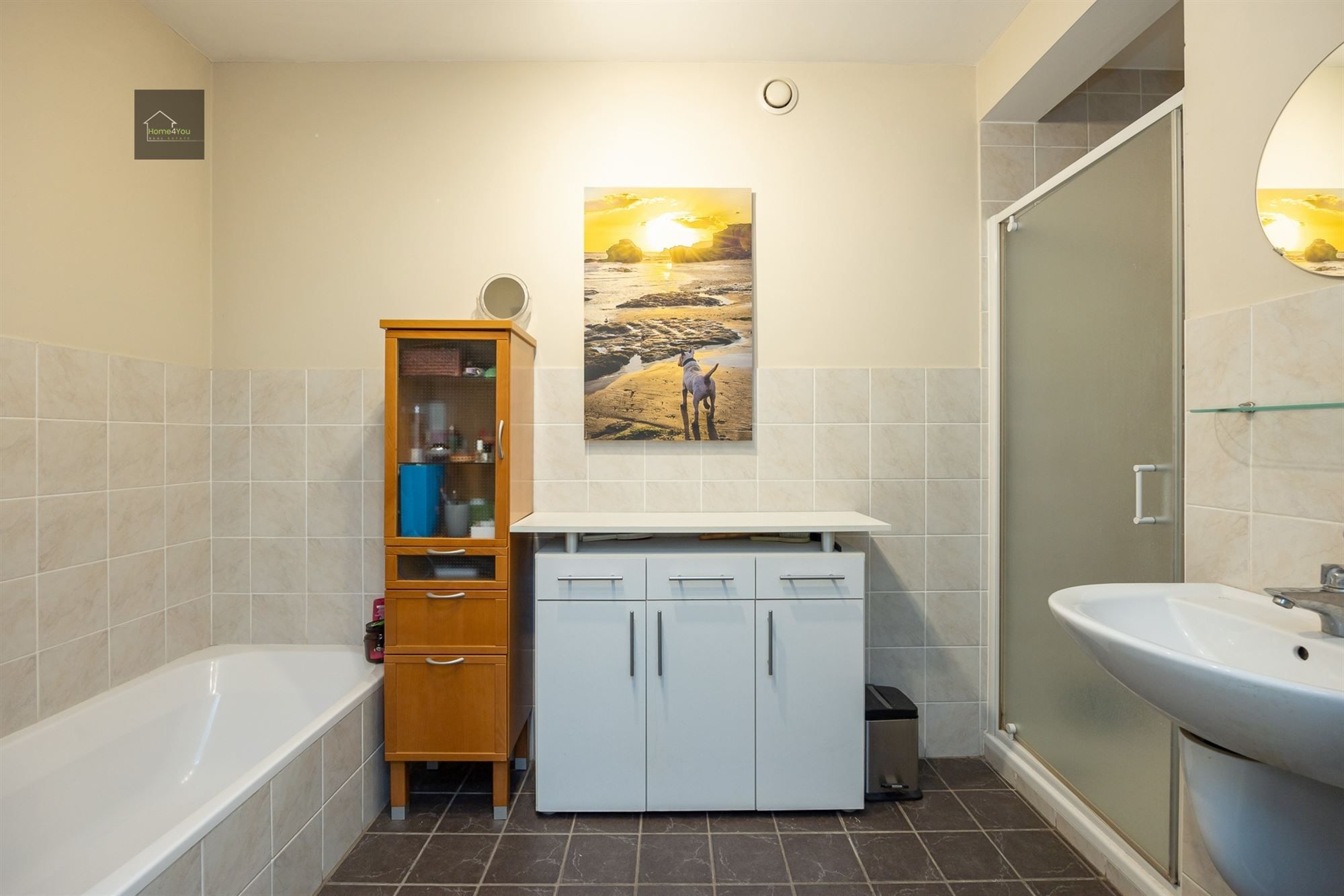 Ruim gelijkvloers appartement met tuin, parking en garagebox foto 14