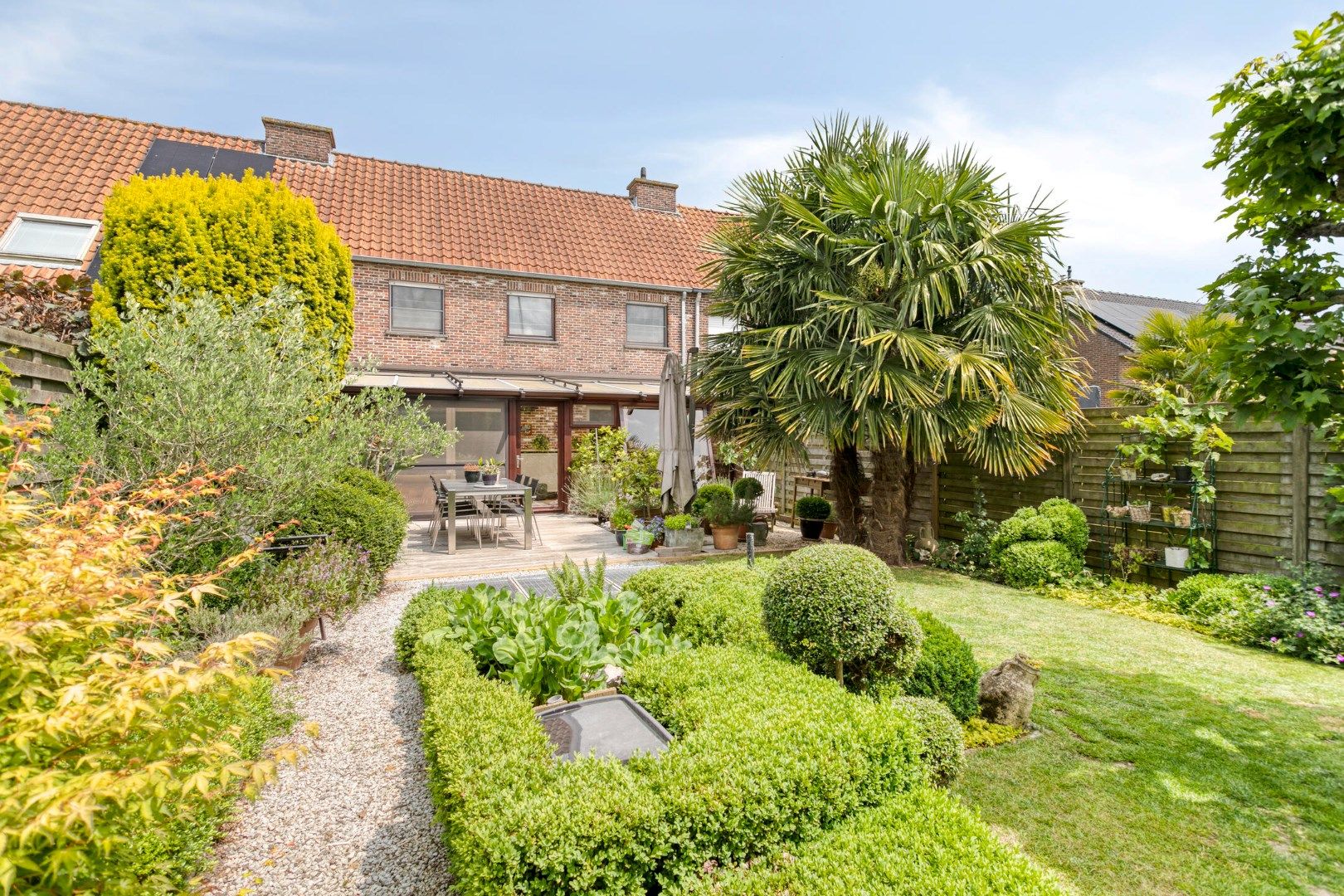 Mooie woning met 3 slaapkamers, garage en prachtige tuin! foto 17