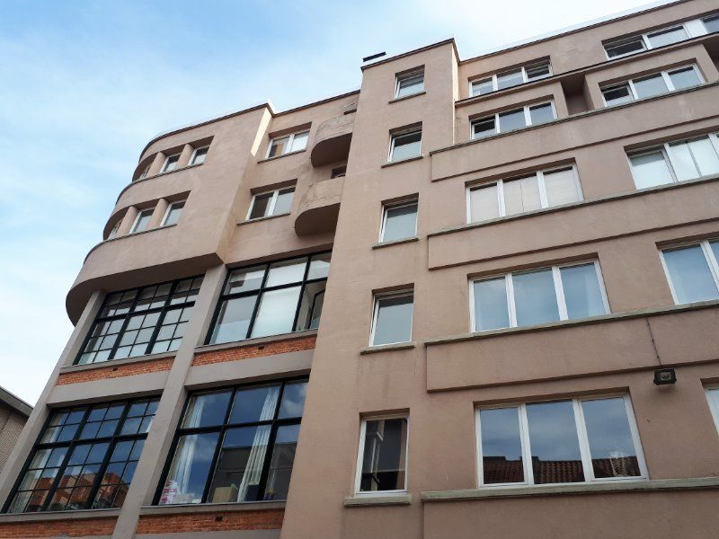 Zeer lichtrijk 2 slaapkamerappartement met parkeerplaats en schitterend zicht op de torens van Gent! foto 5