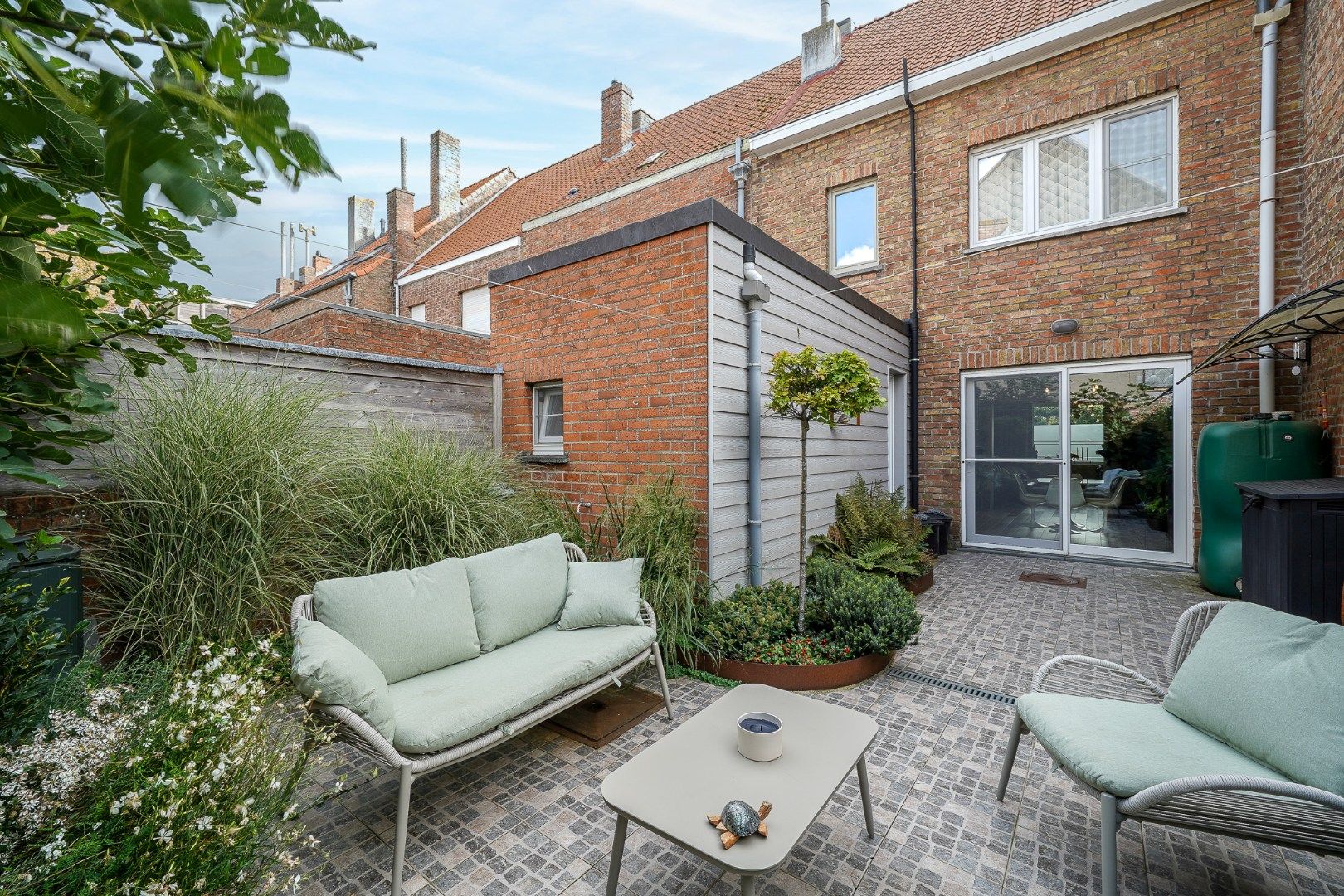 Instapklare gezinswoning met gezellige stadstuin in Oostende foto 10