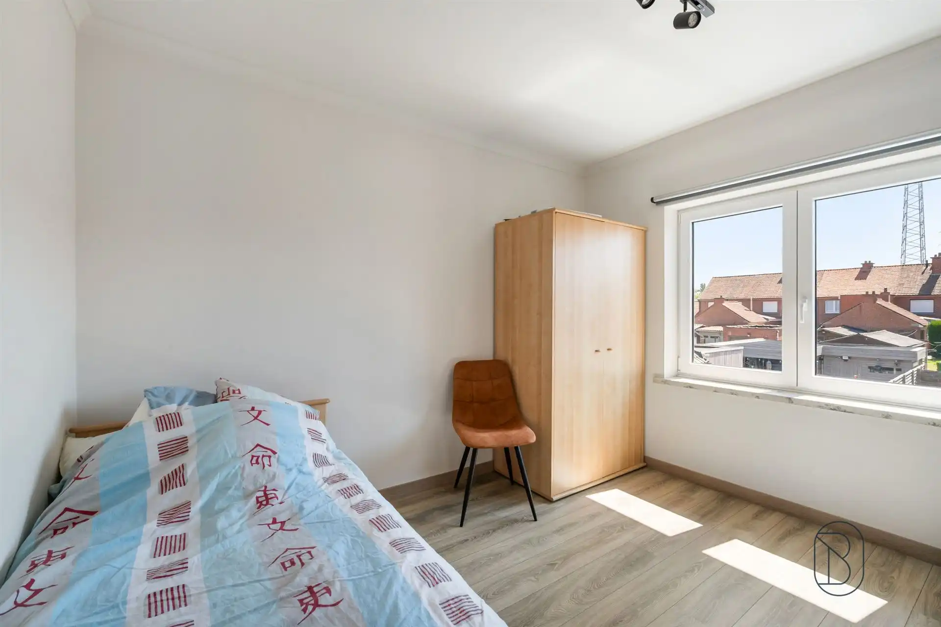 Instapklare woning met zonnige tuin, garage & tweede uitweg foto 11