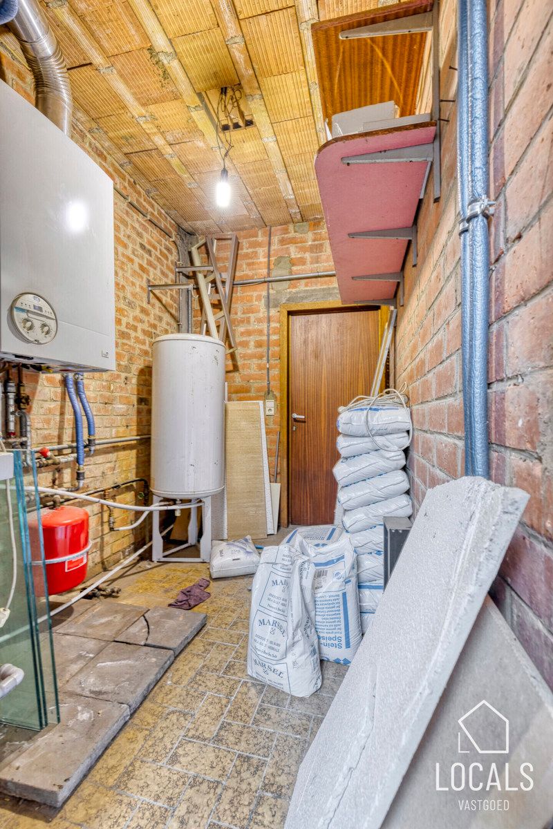 Handelspand met woonst, tuin en garage in centrum Ninove foto 11