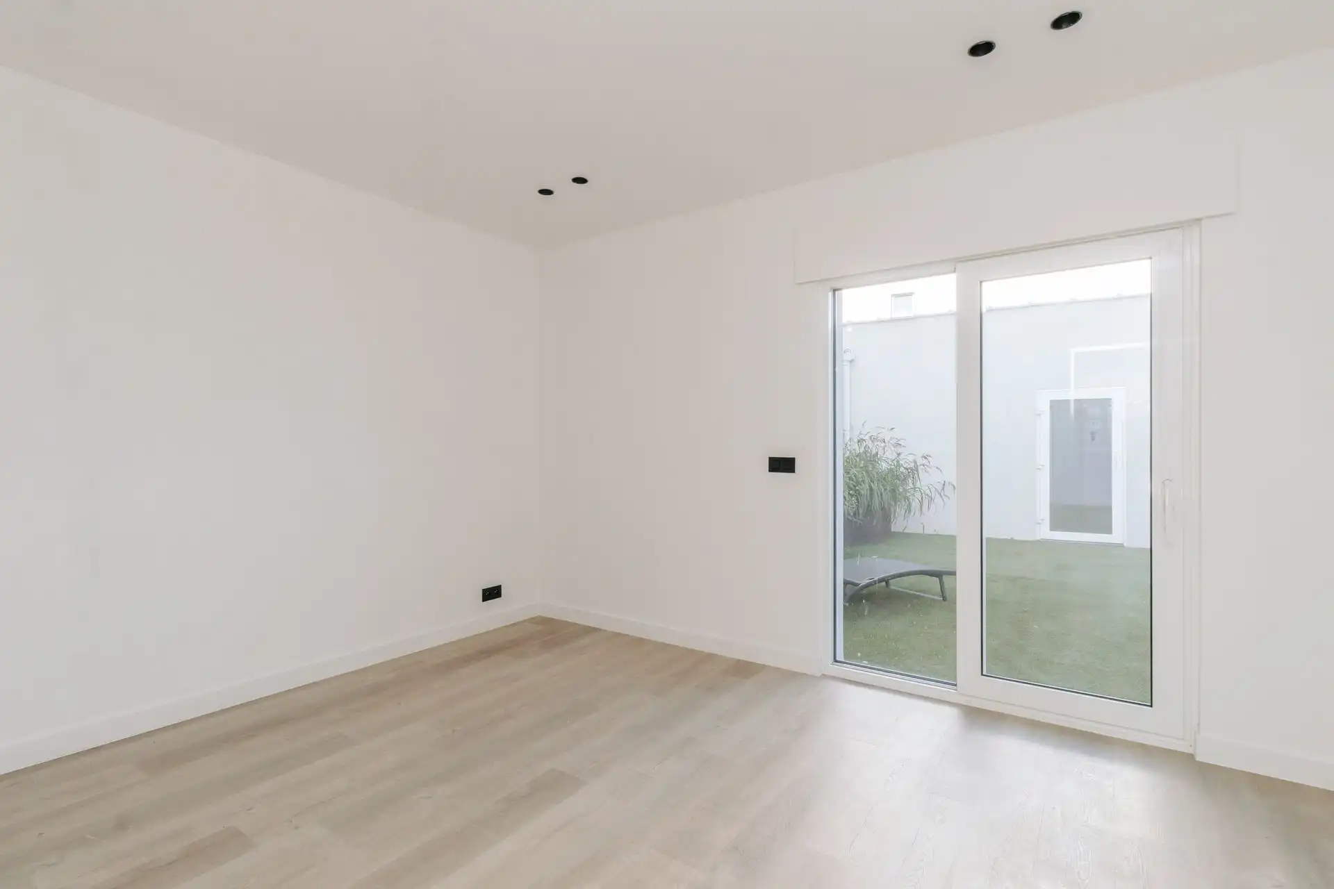 Gelijkvloersappartement met tuintje en garagebox! foto 12