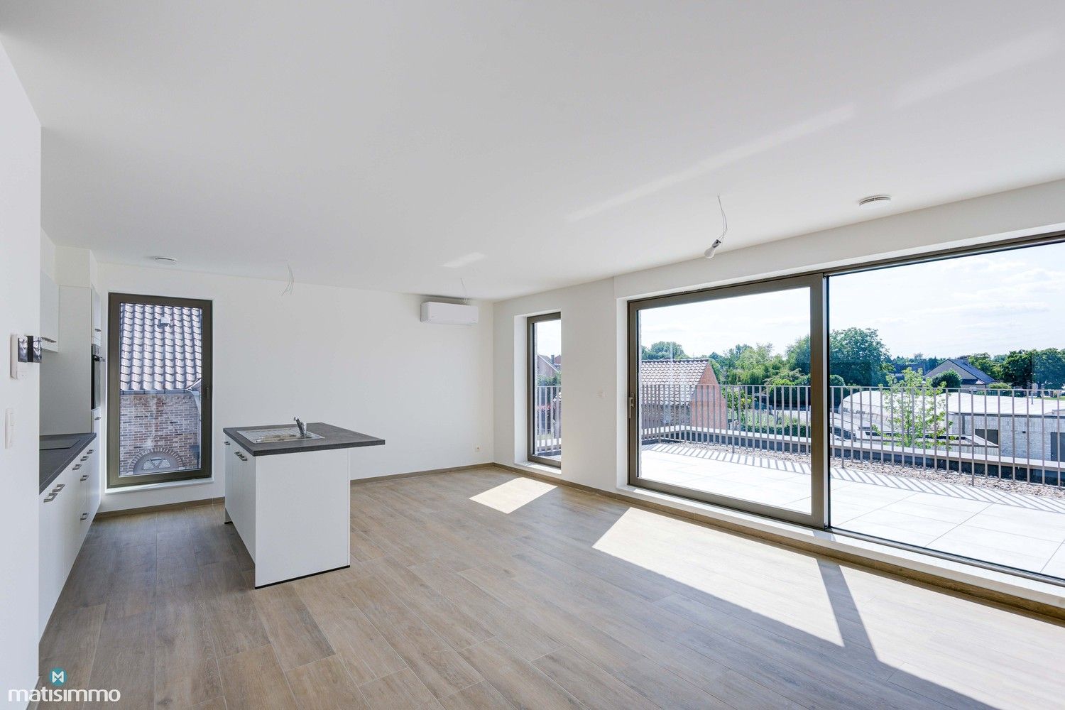 NIEUWBOUWAPPARTEMENT MET TWEE SLAAPKAMERS, RUIM TERRAS EN PARKEERPLAATS TE MUNSTERBILZEN foto 3