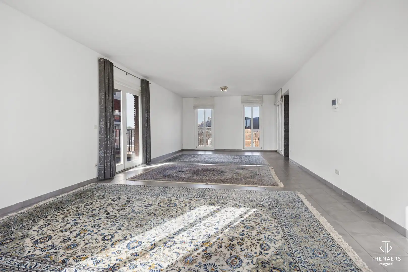 Ruim appartement van 166 m² met 2 terrassen en ondergrondse autostaanplaats in hartje Sint-Truiden. foto 3