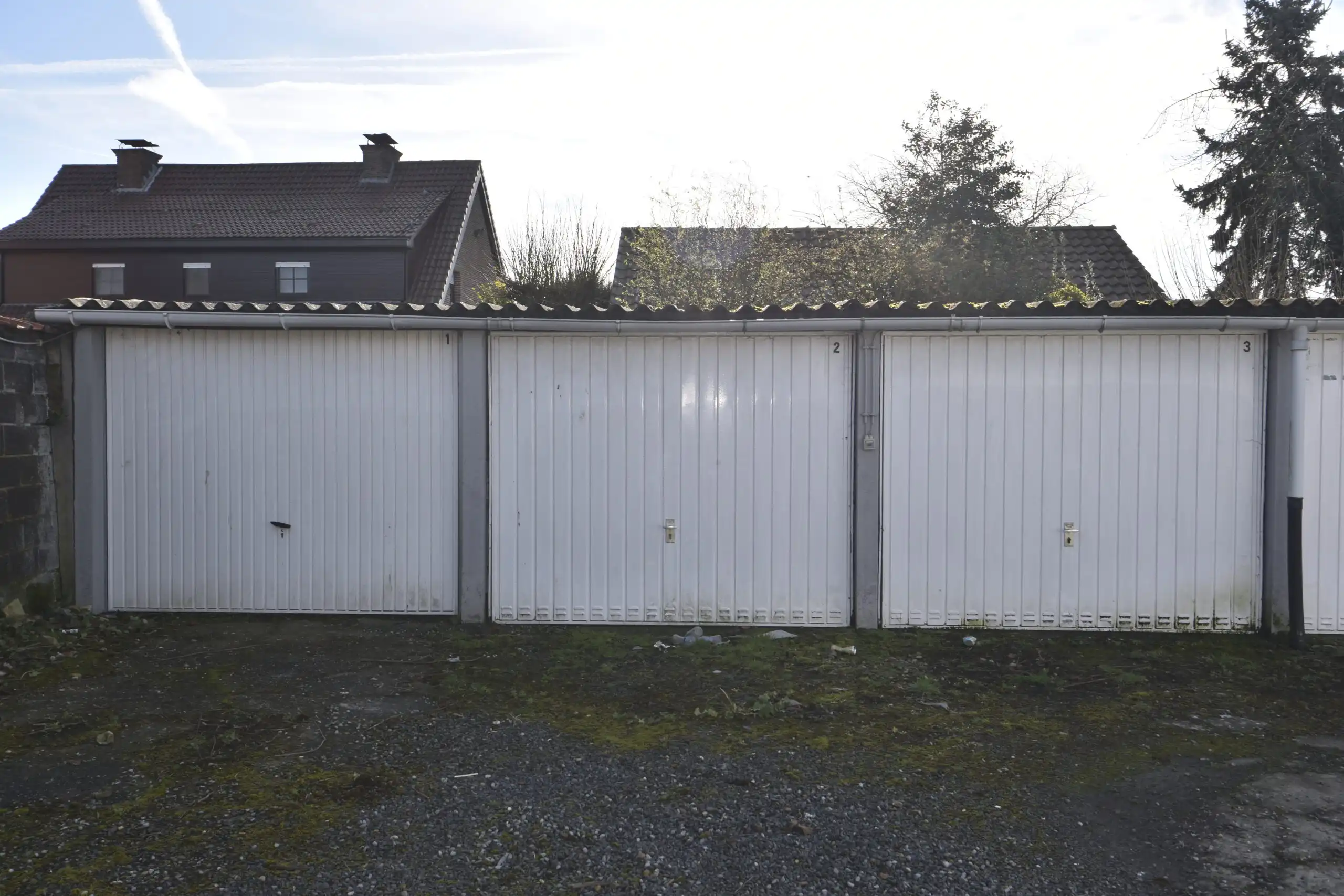 3 garages te koop in Sint-Niklaas foto {{pictureIndex}}