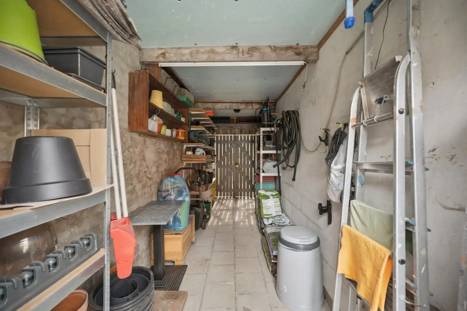 Instapklare rijwoning te Boutersem met tuin en 2 garages foto 24