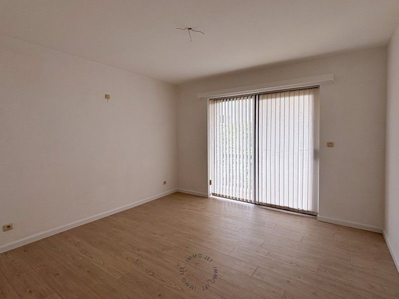 Ruim energiezuinig appartement met 2 slaapkamers en garage te Beveren foto 9
