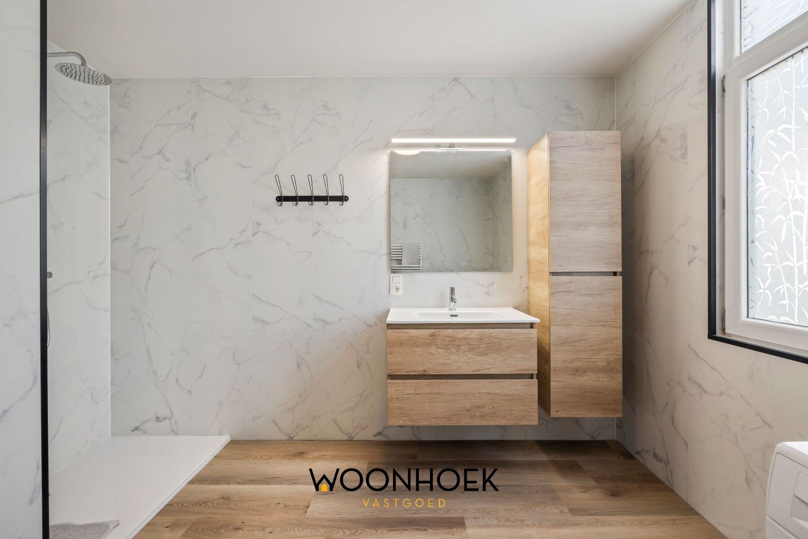 Ruime woning in centrum Waasmunster  foto 9