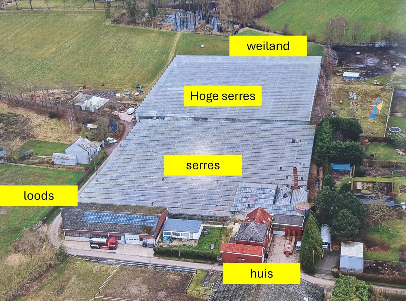 Rustig gelegen woning met grote loods van 480m² op een perceel van 1,9 hectare grond foto {{pictureIndex}}