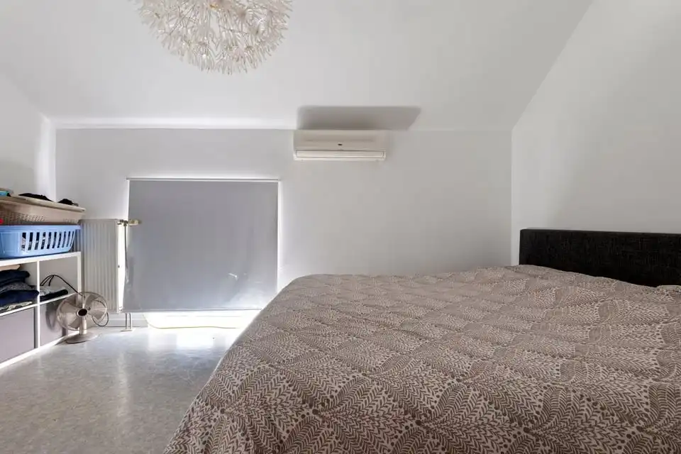 KNAP HANDELSPAND MET TWEE APART VERHUURDE APPARTEMENTEN IN HET CENTRUM VAN SINT-TRUIDEN foto 30