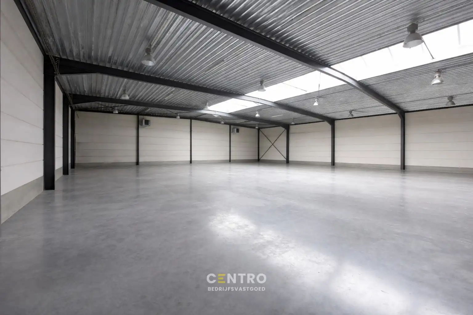 Instapklaar BEDRIJFSGEBOUW (bj. 2009) bestaande uit geïsoleerde MAGAZIJN, KANTOREN en een luxueus afgewerkte LOFT-APPARTEMENT op verdieping. Op bedrijventerrein "Oude Barriere" te Diksmuide. foto 4