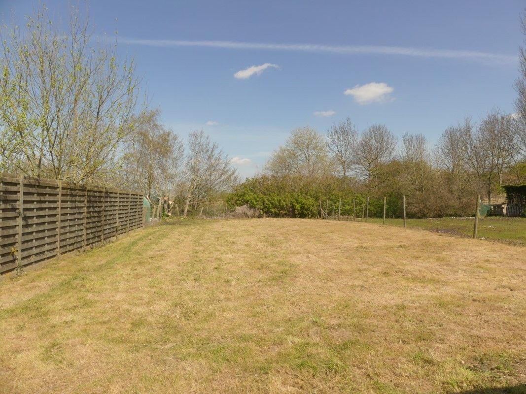 Instapklare gezinswoning met afzonderlijke garage en tuin foto 15
